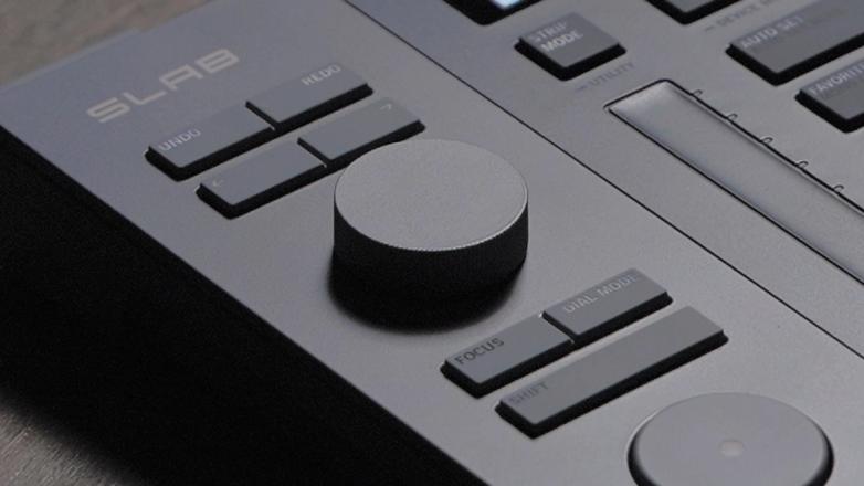 Close-up of Serato SLAB, a Studio-native MIDI pad controller, showing the Dial.