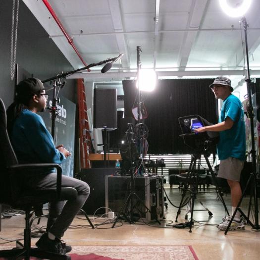 OP! reading from a teleprompter at the Serato NYC studio