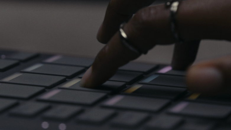 Close-up of Serato SLAB, a Studio-native MIDI pad controller showing SLAB's exclusive Pad FX.